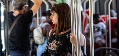 Copyright: ALSTOM Passenger holding onto railway in tramway