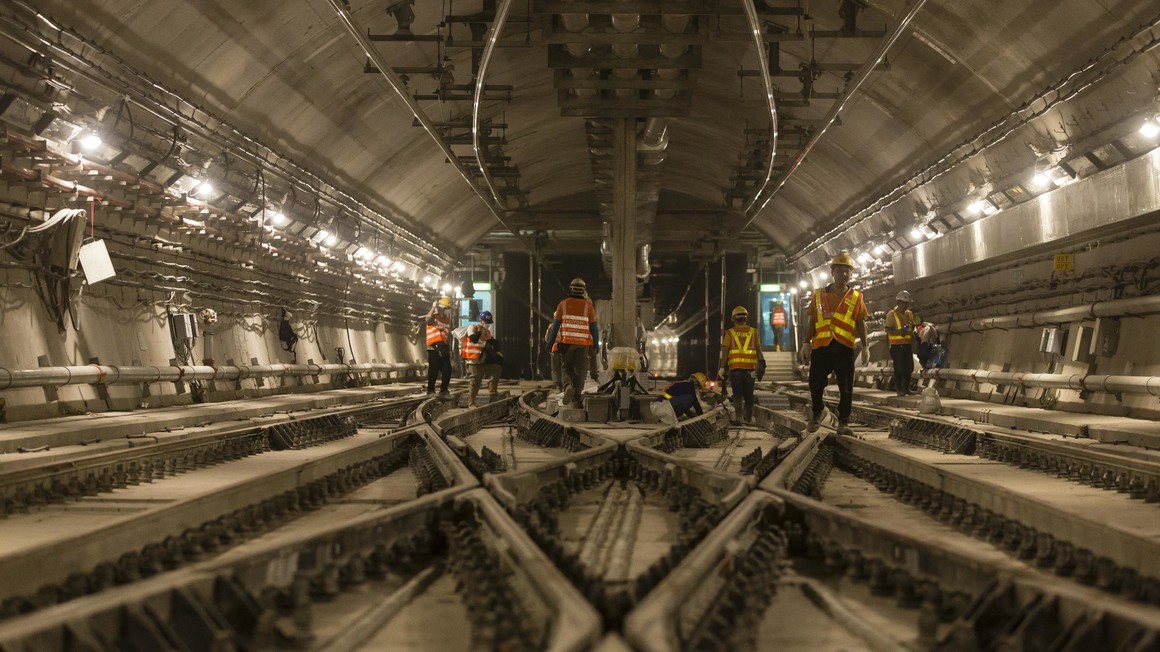 Alstom employees working on signalling at Ho Man Tin station, South Island, Hong Kong. | Copyright/Ownership: Alstom/Arnaud Février