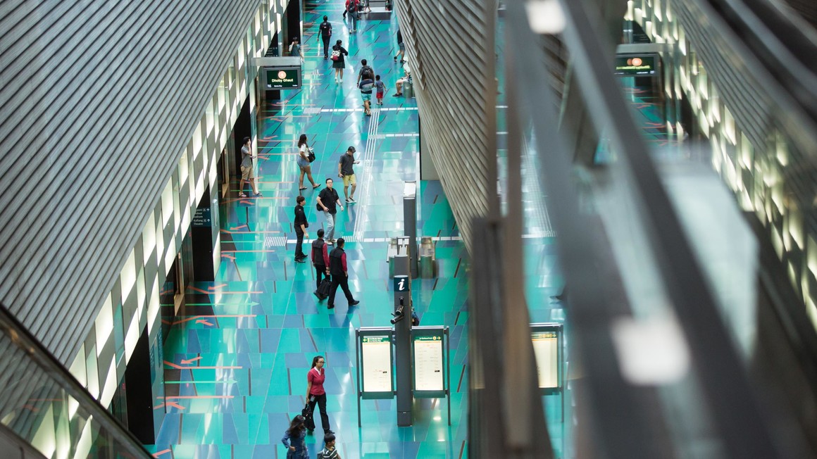 Singapore ; Stadium Station ; Platform B, Circle Line , people leaving metro, Driverless