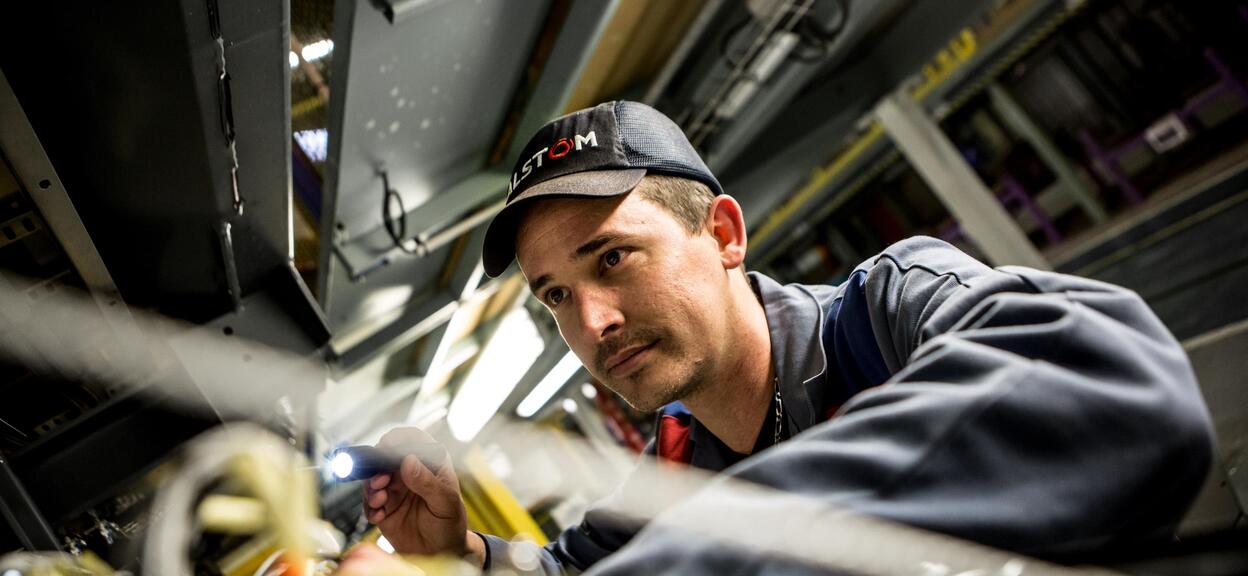 People at work. Alstom Valenciennes site. Petite-Forêt. France.