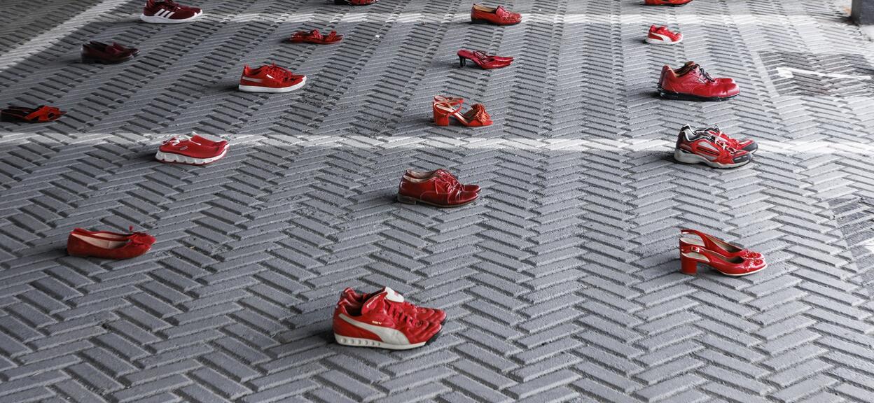 Red shoes installation Italy November 2022 Savigliano site