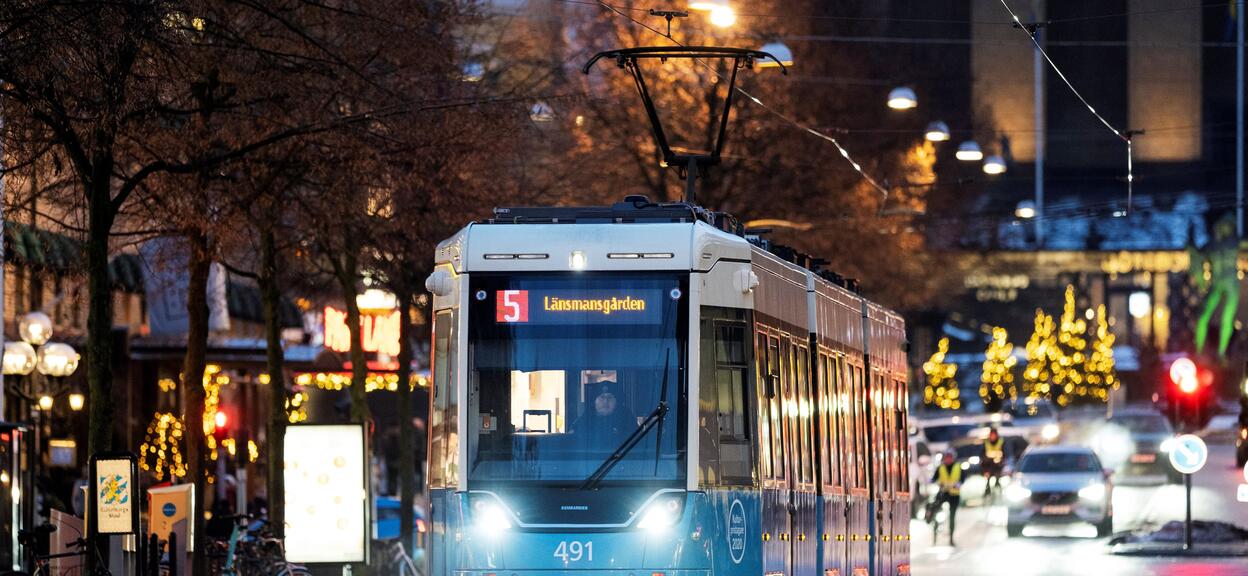 Flexity light rail tram at night on street in Gothenburg, Sweden