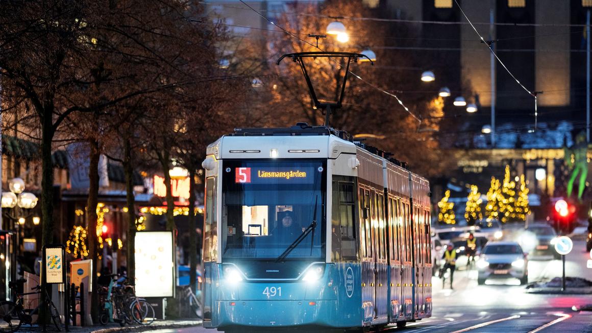 Flexity light rail tram at night on street in Gothenburg, Sweden