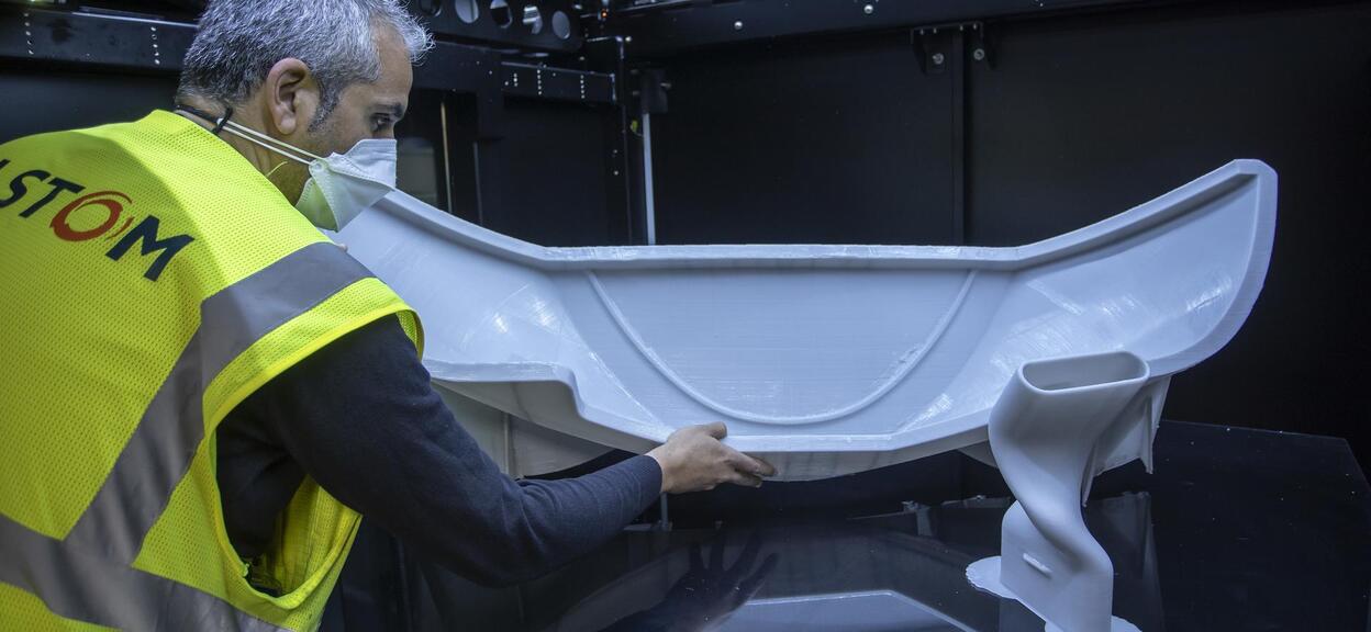Alstom employee working on a 3D printed part in Barcelona