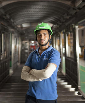 Worker posing in  Sri City site, India