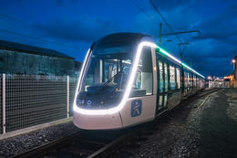 3⁄4 Front view of the Citadis T9 Tramway with IDFM logo and exterior lightning signature. La Rochelle. France. November 2019.