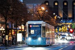 Flexity light rail tram at night on street in Gothenburg, Sweden