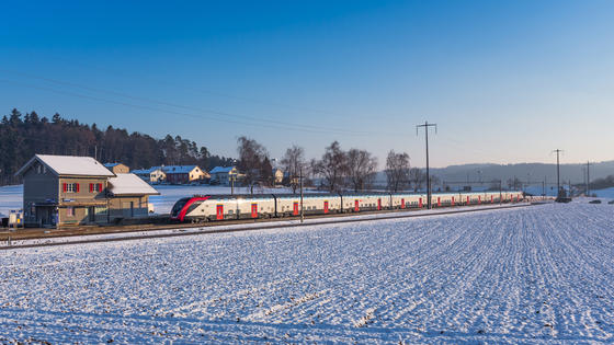 Twindexx Swiss Express (Electric multiple unit (EMU)) - Switzerland in snowy winter landscape.  Double-deck train for SBB CFF FFS (Swiss Federal Railways)