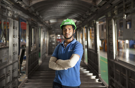 Worker posing in  Sri City site, India