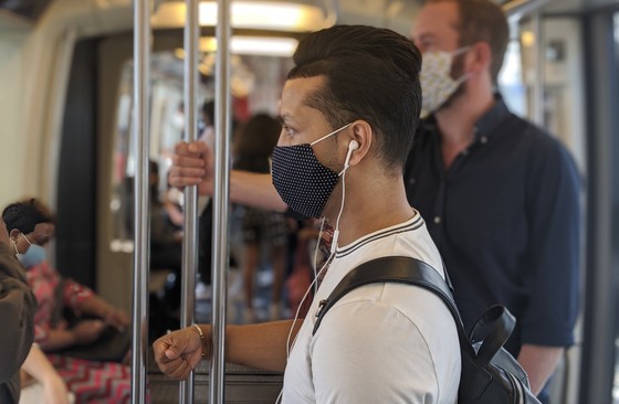 Paris Metro passengers with face masks