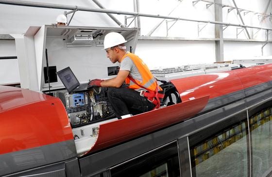 Citadis inside the maintenance depot (EMC) - People working on the roof of the tram - Casablanca - Morocco - November 2012