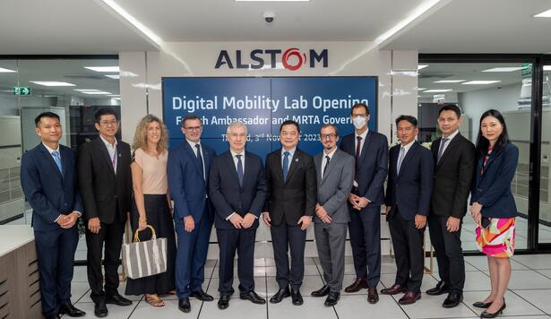 People standing in front of Alstom Digital Mobility Lab opening