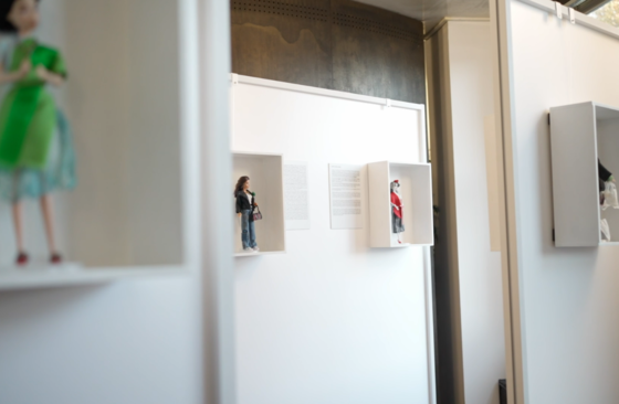 Barbie doll displayed on wall