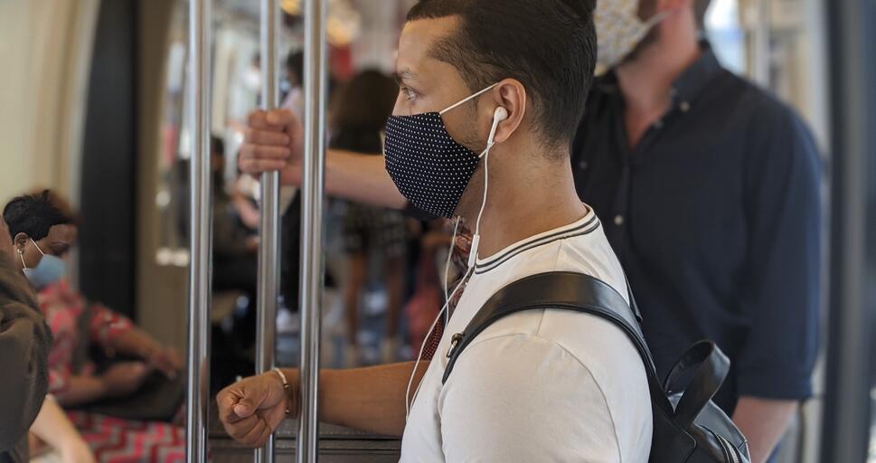 Paris Metro passengers with face masks