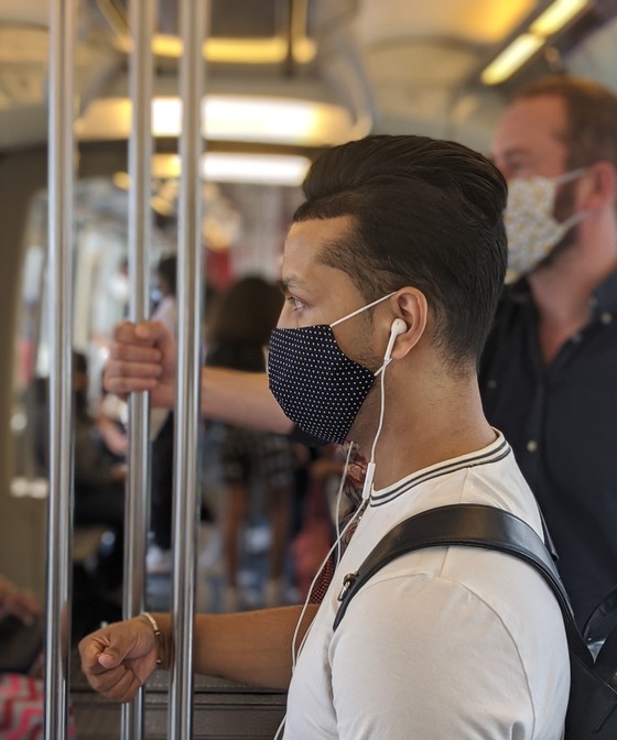 Paris Metro passengers with face masks